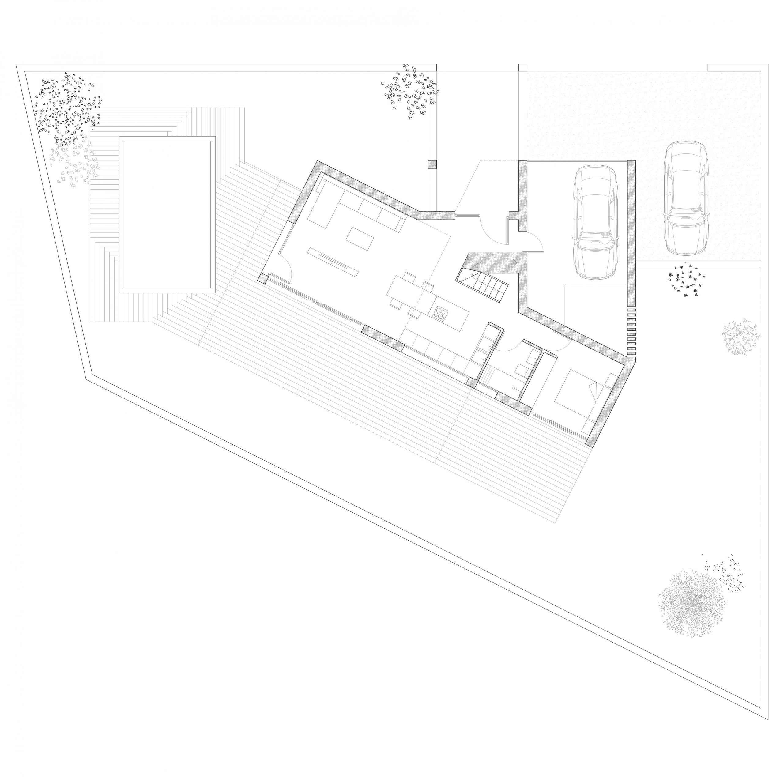 En esta vivienda unifamiliar Recon Arquitectura diseñó una casa que se adaptara a la forma triangular del solar
